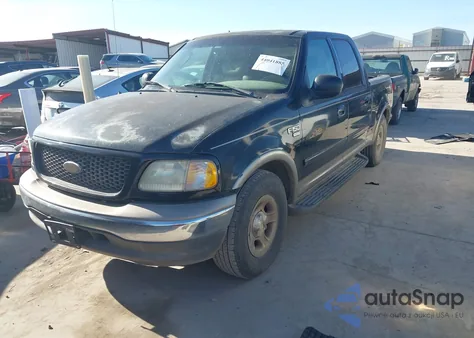 2002 Ford F-150 Lariat/Xlt z USA, uszkodzony, nr VIN 1FTRW07LX2KC79826